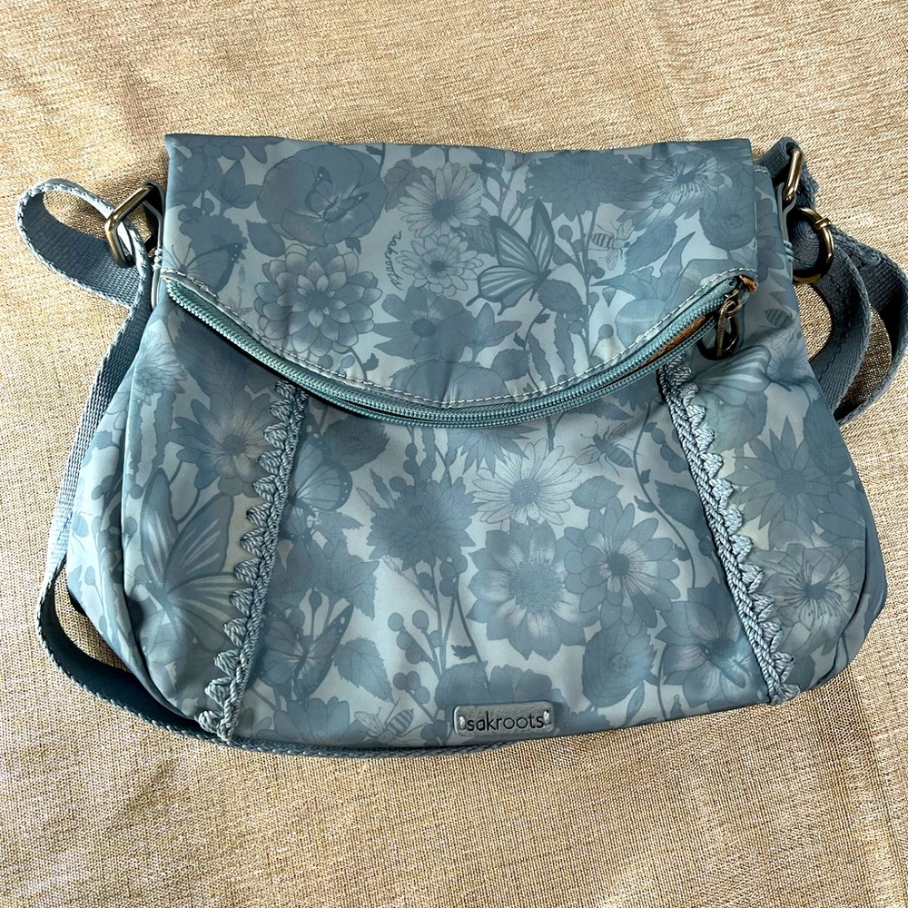 Sakroots beautiful blue pocketbook. Measures 12” W by 10” D. Excellent condition